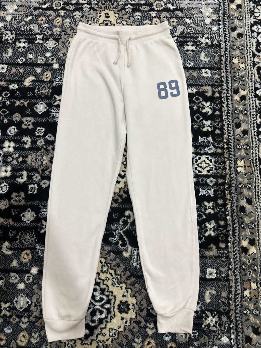 Preloved Primark Cares Beige Jogger Trousers with “89” Print
