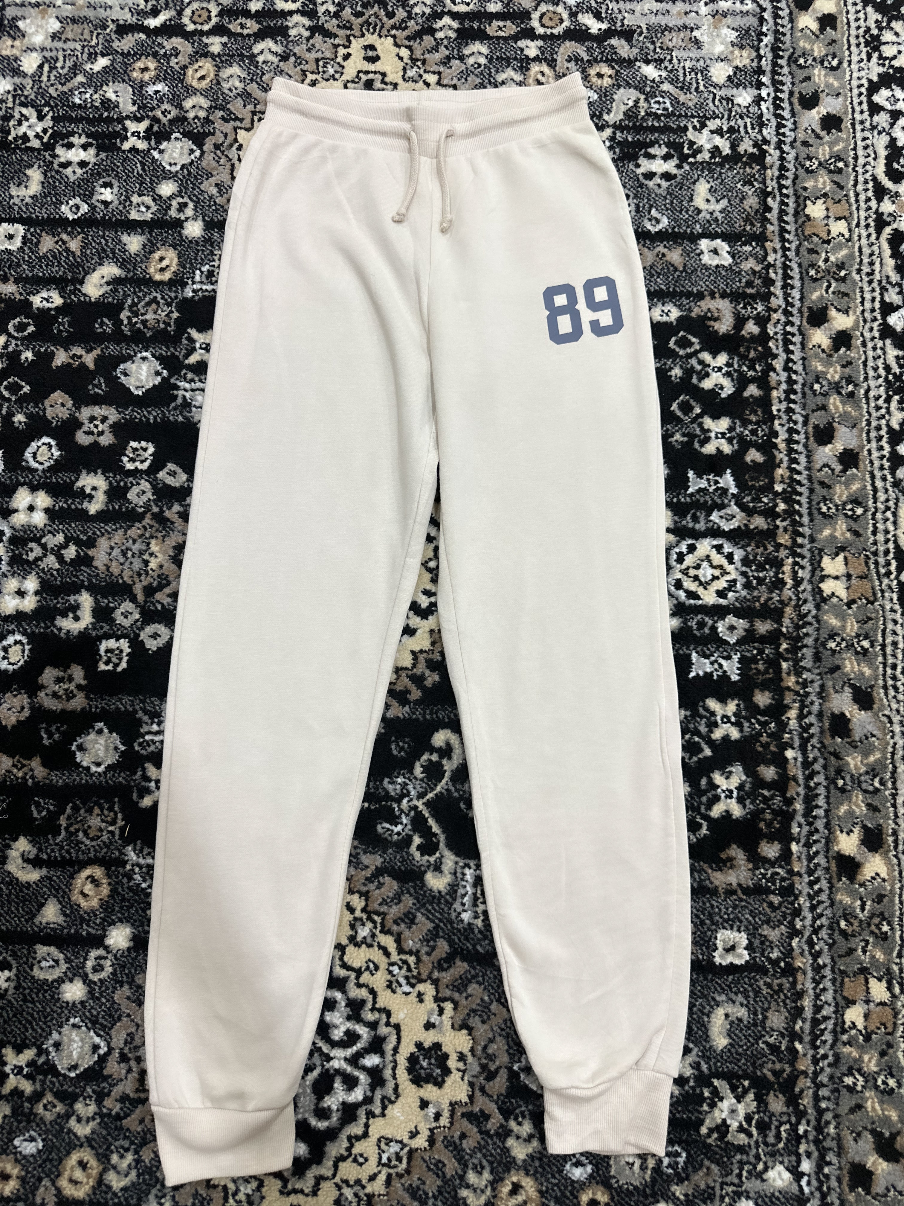 Preloved Primark Cares Beige Jogger Trousers with “89” Print